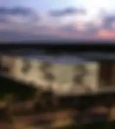 Propiedad LUXIMIA MED Imagen 02fachada_noche_desarrollo_luximiamed_cancun.jpg